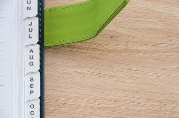 Diary quarter on a wooden table