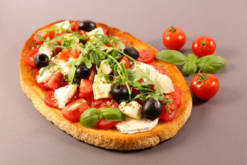 bruschetta with tomato, mozzarella and basil