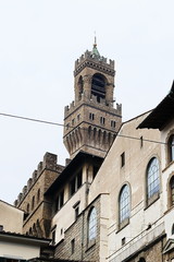 Fototapeta na wymiar Arnolfo tower of Palazzo Vecchio, Florence, Italy