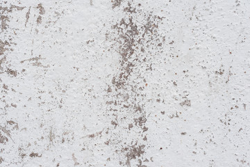 Wall fragment with scratches and cracks