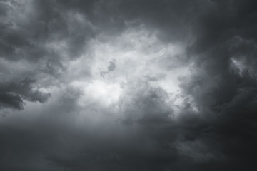 Storm clouds in the sky over the city. Gray gloomy sky before hurricane