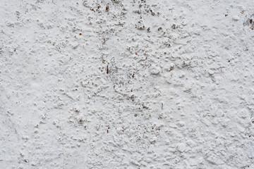 Wall fragment with scratches and cracks