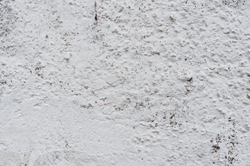 Wall fragment with scratches and cracks