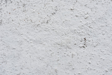 Wall fragment with scratches and cracks