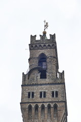 Fototapeta na wymiar Arnolfo tower of Palazzo Vecchio, Florence, Italy