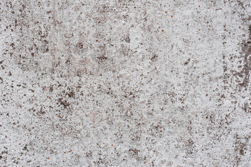 Wall fragment with scratches and cracks