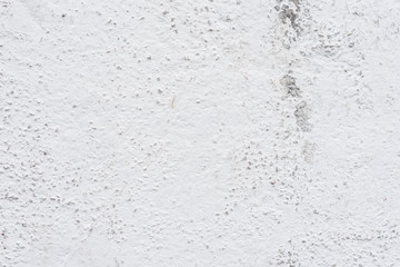 Wall fragment with scratches and cracks