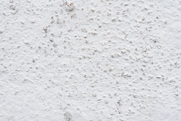 Wall fragment with scratches and cracks