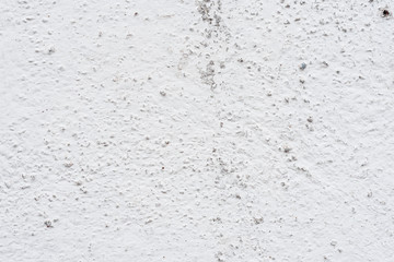 Wall fragment with scratches and cracks