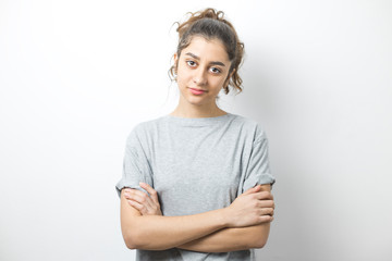 Portrait of a frustrated and upset Indian girl on white background.