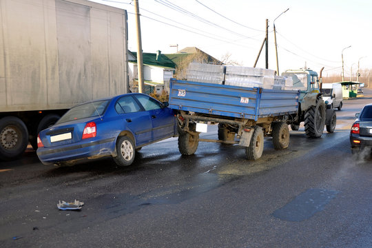 Passenger Car Collided With A Cargo Trailer On The Road