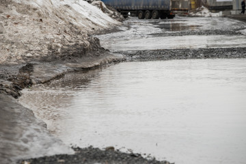 warming in early spring, snow melts turning into slush and puddles underfoot, which bypass the...