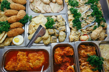 Big banquet table with chafing dish heaters