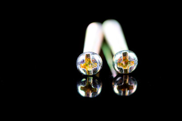 Screw in the black background