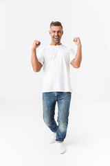 Fototapeta premium Full length portrait of a handsome casual man