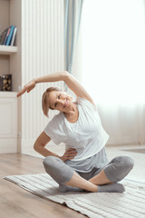 Yoga Classes at Home Beautiful Women Over 50 Years.
