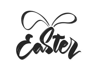 Hand drawn calligraphic modern brush type lettering of Happy Easter with bunny ears.