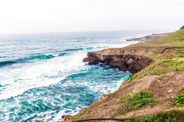 Lush green landscape and Seascape, Al Mughsayl Rocky Beach, Salalah, Oman