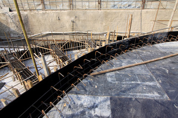 Wooden scaffold in the construction site