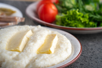 Mengrelian corn mamalica (ghomi) with cheese. Georgian food.
