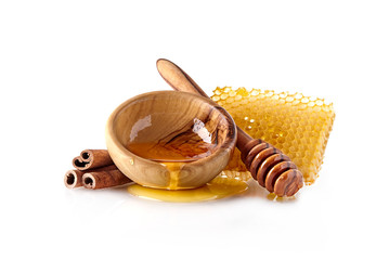 Honeycomb with liquid honey and cinnamon