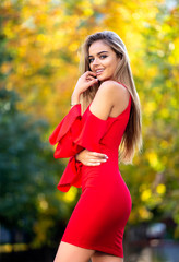 beautiful young woman in red dress  smiling