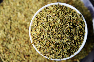 Fennel Seeds or Roasted saunf in a bowl, selective focus