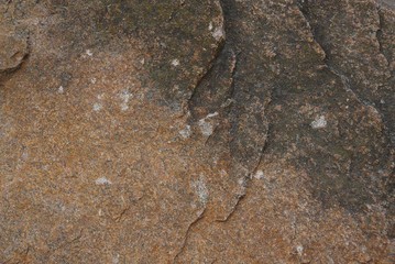 brown gray stone texture from a piece of dirty granite