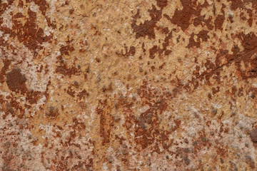 Texture of ferruginous brown wall. Retro rusty rough wall grunge stucco. Abstract grunge stucco wall background. Vintage abstract pattern with rusty wall. Grunge orange background texture.