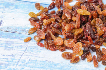 raisins on wooden background