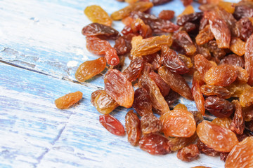 raisins on wooden background