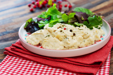 Traditional Parmentier of fish with chives