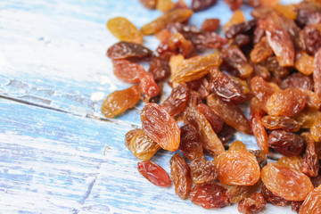 raisins on wooden background