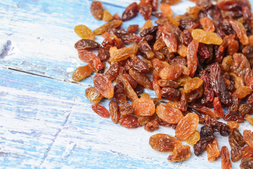 raisins on wooden background