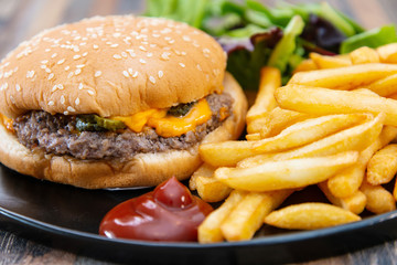 Cheese burger - American cheese burger with Golden French fries
