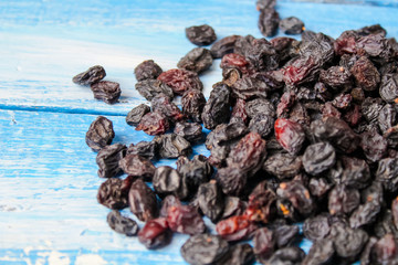 raisins on wooden background