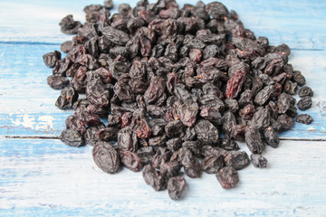 raisins on wooden background