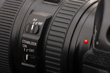 Close up view of a DSLR camera in dark atmosphere