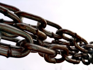 A chain is a serial assembly of connected pieces, called links, typically made of metal, with an overall character similar to that of a rope in that it is flexible and curved in compression but linear