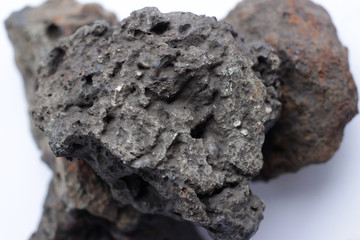 Gray meteorite stone with high iron content. © Ihor95