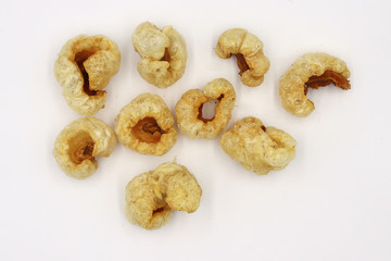 pork snack, pork rind, pork scratching , pork crackling isolated on white background