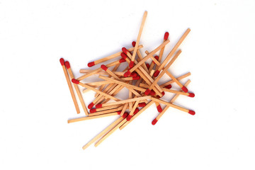 Matchstick  out of matchbox isolated on white background