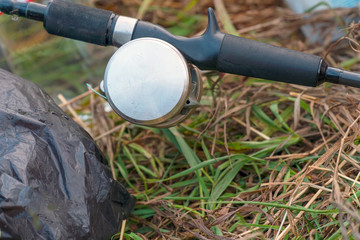 Spinning with baitcasting reel on grass