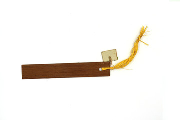 rustic wood tag with thin rope, wooden book mark isolated on white background