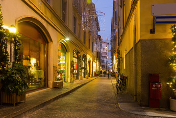 Fototapeta na wymiar Night Christmas illumination of Parma in Italy