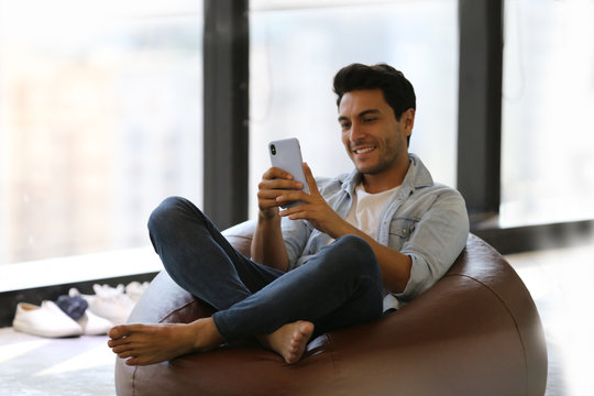 Thoughtful designer relaxing at the creative office