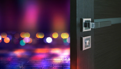 Empty scene background. Open wooden doors. Behind the open door background with night blurred lights, bokeh, neon lights