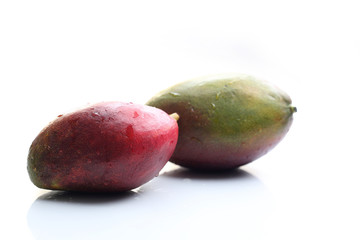 Mango.Mature, exotic, tropical mango fruit on a white background.