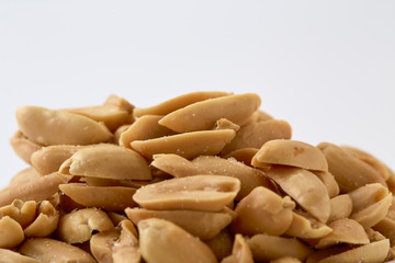 Roasted peanuts and salt in a bowl