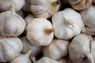 Many of garlics putting in the basket for food background.